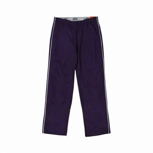 Dlhé športové nohavice Nike Taffeta Pant Seasonal Dama Tamno plava Cijena
