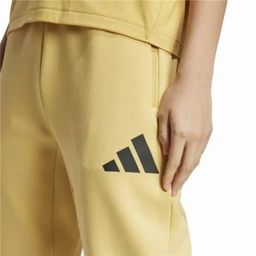 Dlhé športové nohavice Adidas Z.N.E. Rumena Dama Cijena