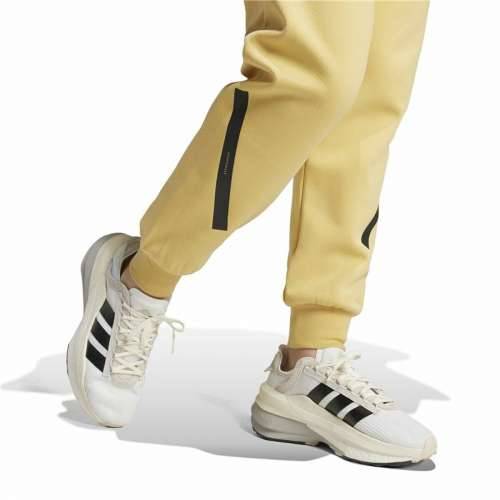 Dlhé športové nohavice Adidas Z.N.E. Rumena Dama Cijena