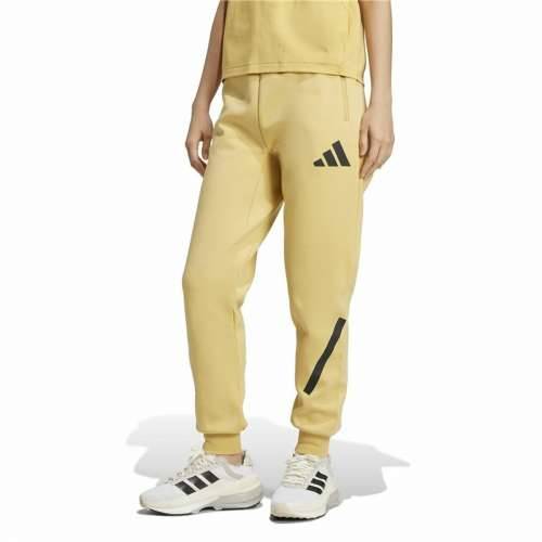 Dlhé športové nohavice Adidas Z.N.E. Rumena Dama Cijena